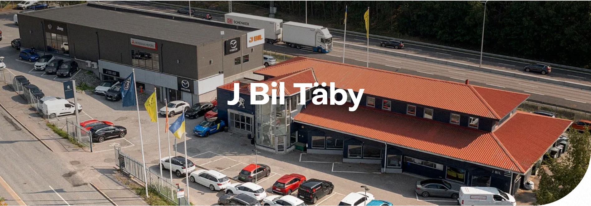 J BIL Täby